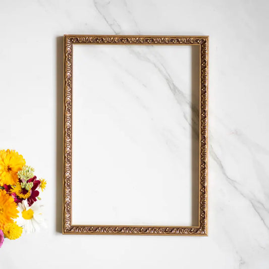 This A4-sized wood frame in a golden bronze color (21x30 cm or 8.26x11.8 in) is designed in an elegant vintage ornate style, perfect for showcasing gallery wall art. Its timeless charm adds sophistication to any artwork or photograph